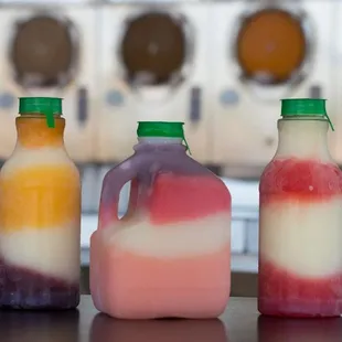 three bottles of yogurt