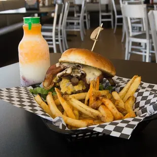a burger and fries in a basket