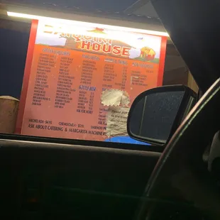 a menu in the back of a car