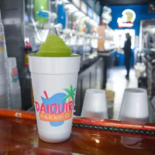 a drink in a plastic cup