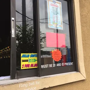 Service window with house drinks and cup sizes