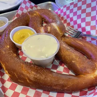 Pretzel with a side of queso