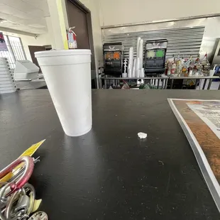 a disposable cup on the counter