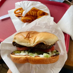 Cheeseburger and seasoned curly fries