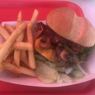 The No Name Burger...grilled mushrooms, bacon, jalapeños and cheese.