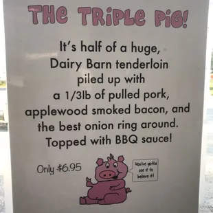 a sign for the triple pig