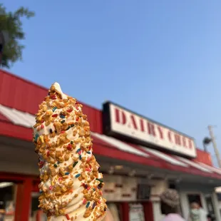 an ice cream cone with sprinkles