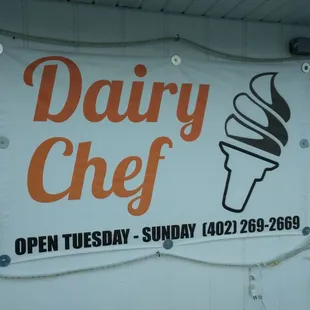 a sign for a dairy chef