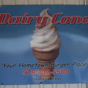 an ice cream cone on a sign
