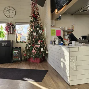 a christmas tree in the kitchen