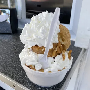 Cream puff sundae with pretzels and extra whipped cream!