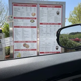 a menu in a car mirror