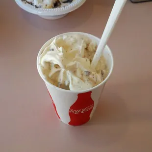 a cup of ice cream on a table