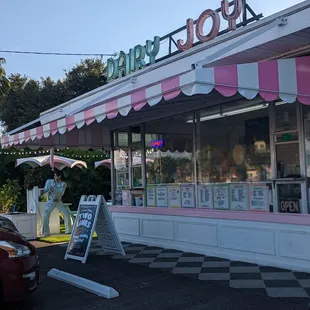 a pink and white ice cream shop