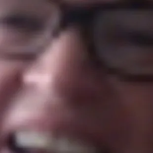 a close up of a smiling woman