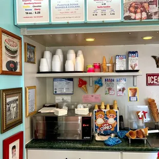 a woman standing in front of the counter