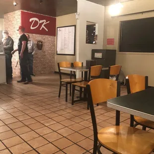 a restaurant with tables and chairs