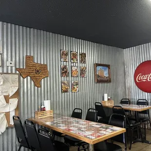 Inside seating (7-8 tables) + outside tables