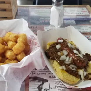 Chili dog and small tots with a large Dr. Pepper. $10.62