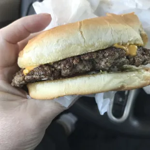 Cheeseburger not much in the toppings department a sad cheeseburger
