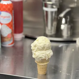 a cone of ice cream on a counter