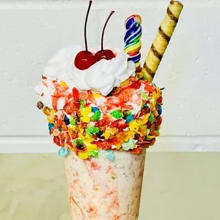 an ice cream sundae with a cherry on top