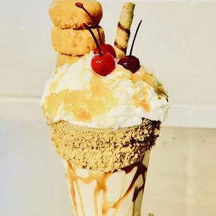 an ice cream sundae with a cherry on top