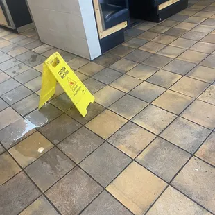 Nasty unmopped slippery dangerous spill