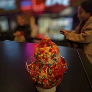 an ice cream cone with sprinkles