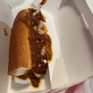 The hot dog looks bitten.