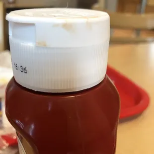 Another nasty ketchup bottle, they need to hand out gloves!