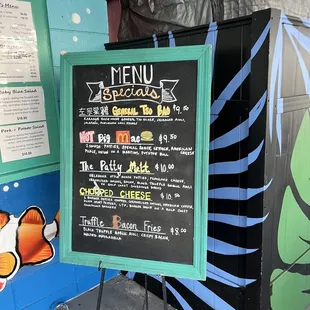 a menu on a chalk board