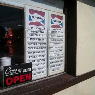 a sign in the window of a restaurant