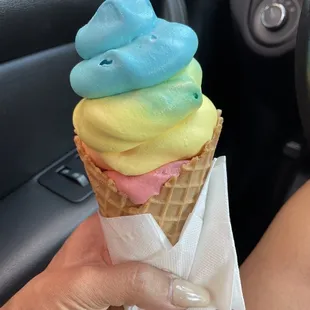 Soft served Superman in a waffle cone.