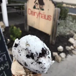 an ice cream cone with a scoop of ice cream