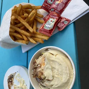 Custard of the day (double scoop) and season fries!