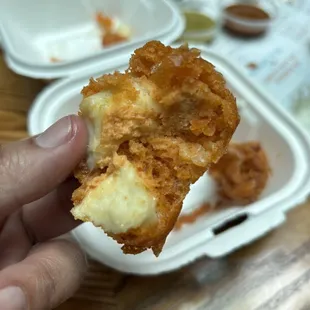 Not cooked all the way and salty curds