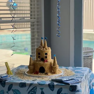 Sandcastle cake, 30+ servings- $265. Triple berry (top) and funfetti (bottom) . Triple berry won!