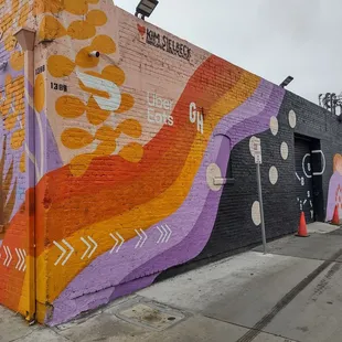 a colorful mural on the side of a building