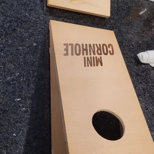 Beat your partner at counter top cornhole.
