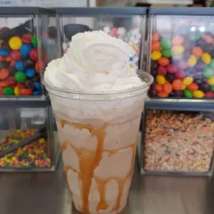 a chocolate milkshake with whipped cream