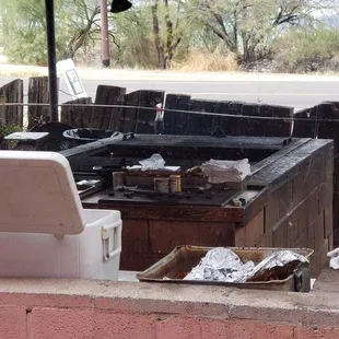 Outside grill that u can watch your meat sizzle from inside