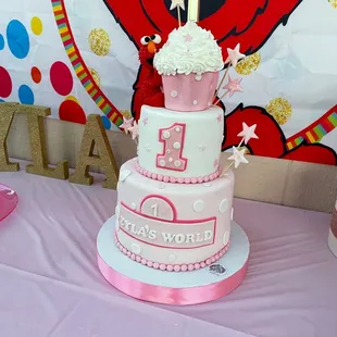 Girly Pink Elmo&apos;s world cake. First birthday.