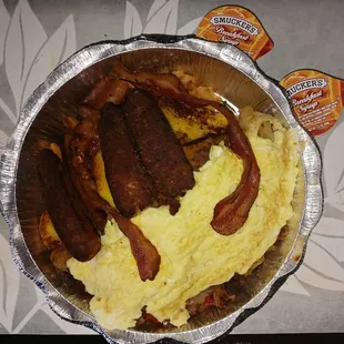 Lumberjack French toast scramble eggs, bacon, and sausage.