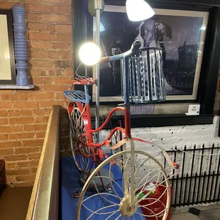 an old bicycle with a wheel