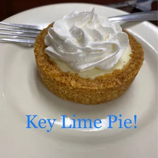 a key lime pie with whipped cream