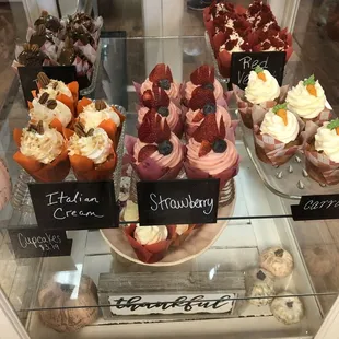 a display of cupcakes