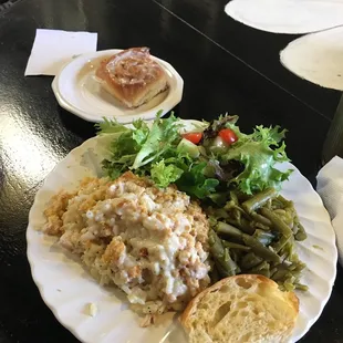 Mondays Special. Poppyseed Chicken, green beans and salad.  All meals come with a cinnamon roll too.