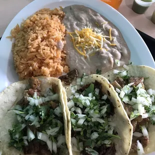 Excellent tacos plate! Tripas, cabeza, carnitas.