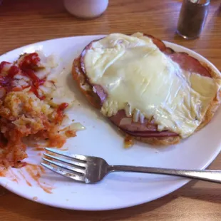 Open face croissant sammich without the egg and a side of hash browns with onions! Yum.